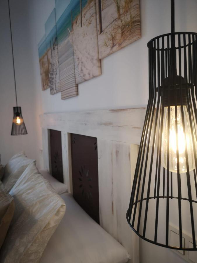 Apartamento Suite Arco De La Villa,Solo Familia Y Parejas,Parking Gratuito 科尼尔-德拉弗龙特拉 外观 照片